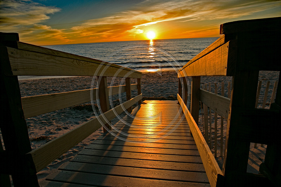 Sun set with stairs at Chappy Beach Falmouth MA