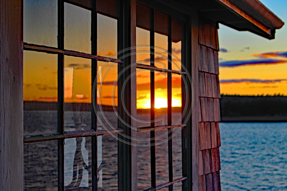 Window pane reflection sunset Cape Cod