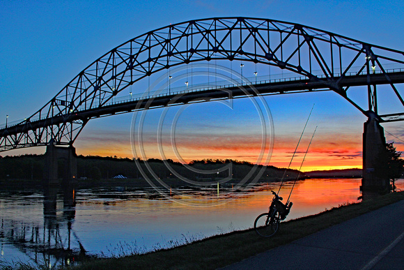 Sunrise at Cape Cod Canal with a Canal Cruiser on standby