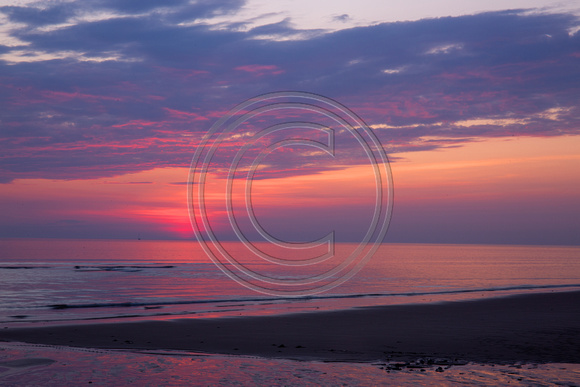 Sunrise with pretty colors on Cape Cod Bay