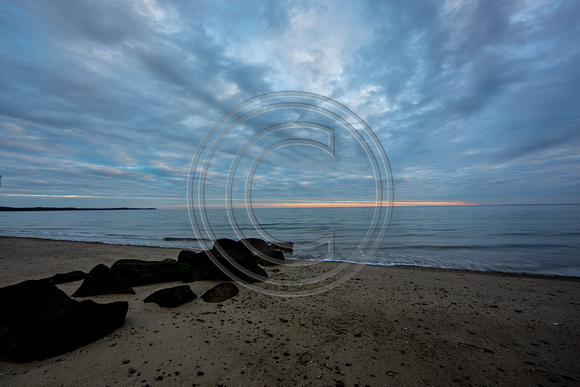 Early sunrise cloud cover Sagamore Beach Cape Cod