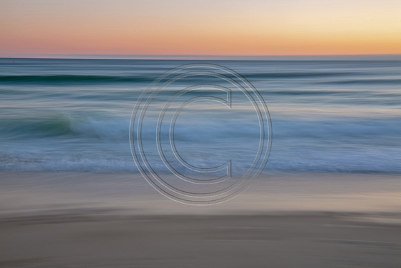 Sagamore Beach with daybreak waves on Cape Cod