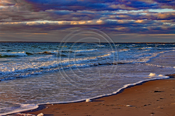 Chappy with choppy waves at sunset on Buzzards Bay, Cape Cod